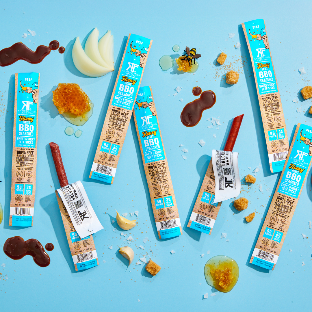 Honey heist BBQ Sticks on blue background with ingredients 