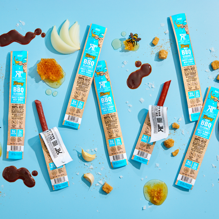 Honey heist BBQ Sticks on blue background with ingredients 