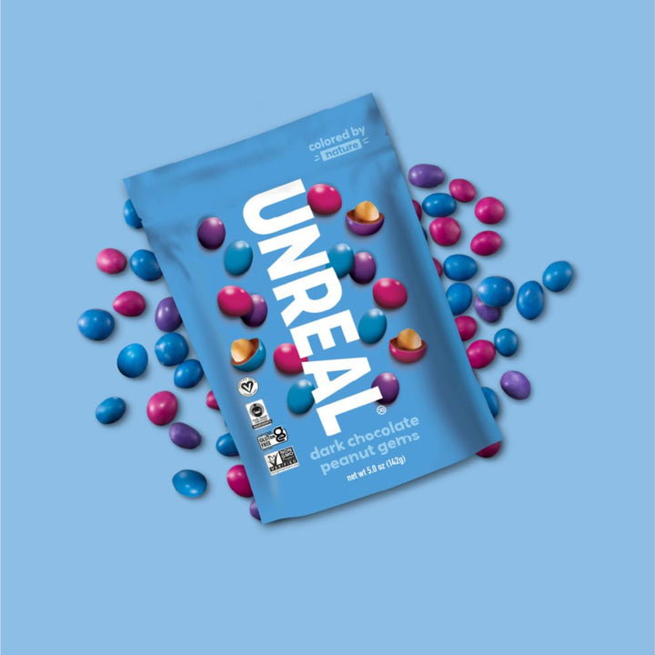 UnReal Dark Chocolate Peanut Gems Snack Pack 1.5oz lifestyle image