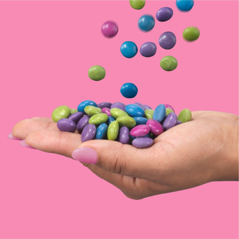 UnReal Milk Chocolate Gems Snack Pack 1.5oz  lifestyle image
